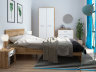 На фото прикроватная тумбочка MATOS KOM1S BRW в комплекте мебели для спальни